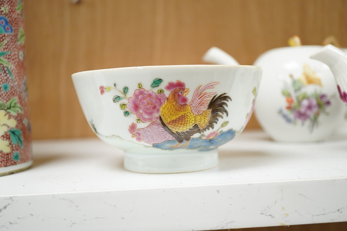 A Chinese famille rose bowl enamelled with a chicken amongst flowers, 12.5cm in diameter